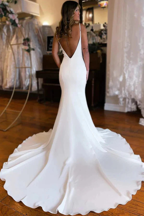 Back view of the satin mermaid wedding dress with a court train.