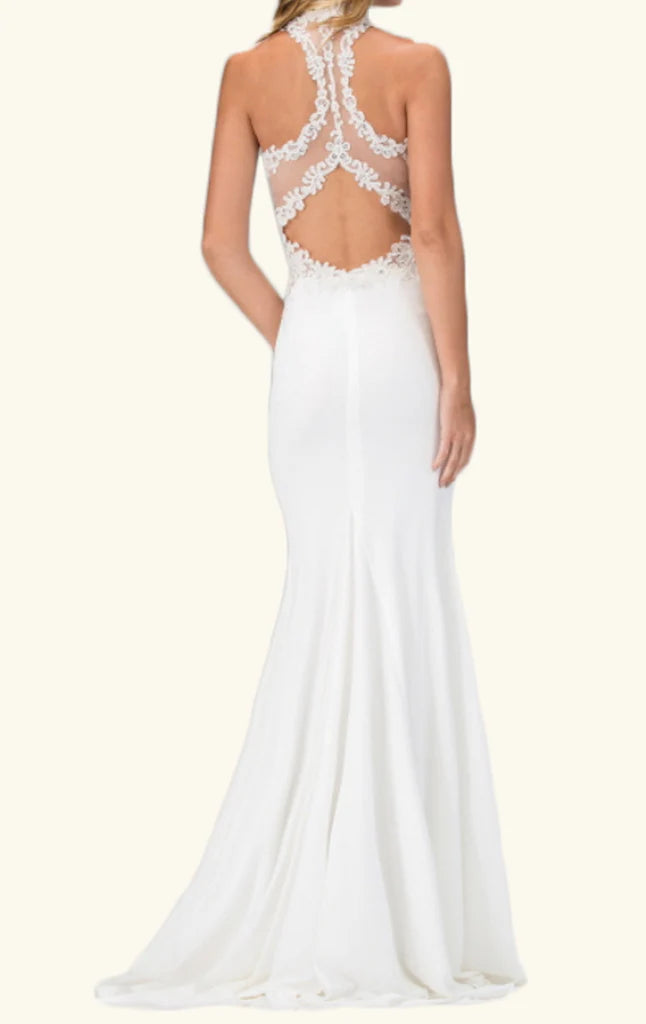Back view of a mermaid plunging V-neck formal gown with a flowing train.