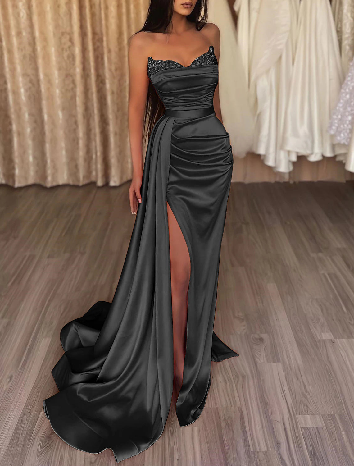 Side view of the strapless mermaid gown, highlighting the ruched bodice and court train.
