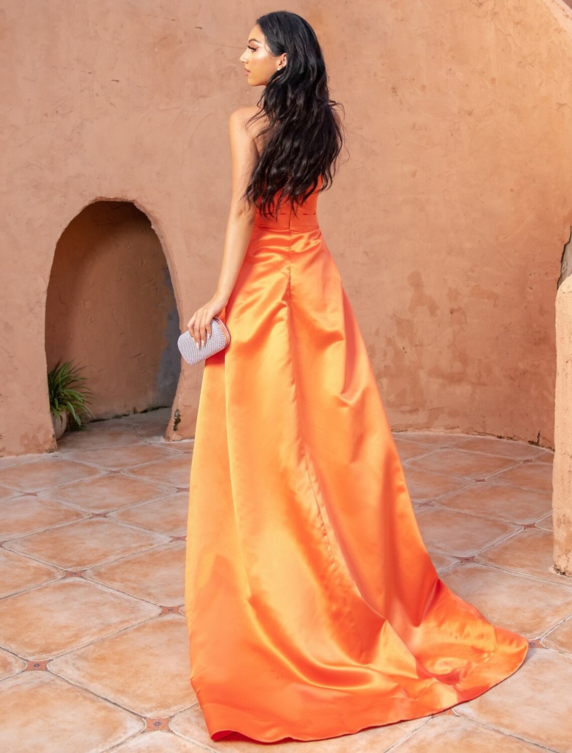 Full-length view of the mermaid gown, showcasing its overall silhouette and formal appeal.