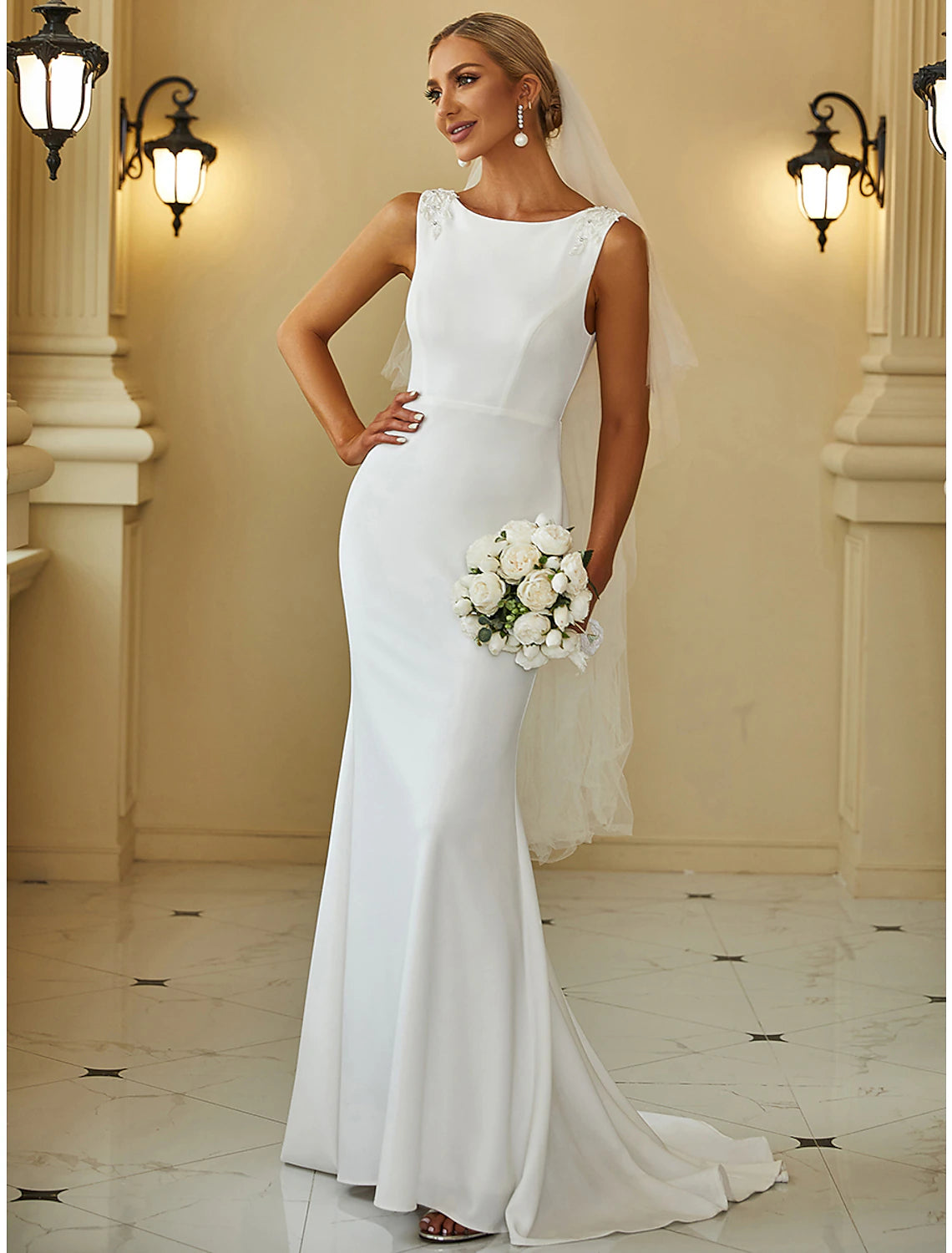 Back view of the elegant mermaid wedding dress.