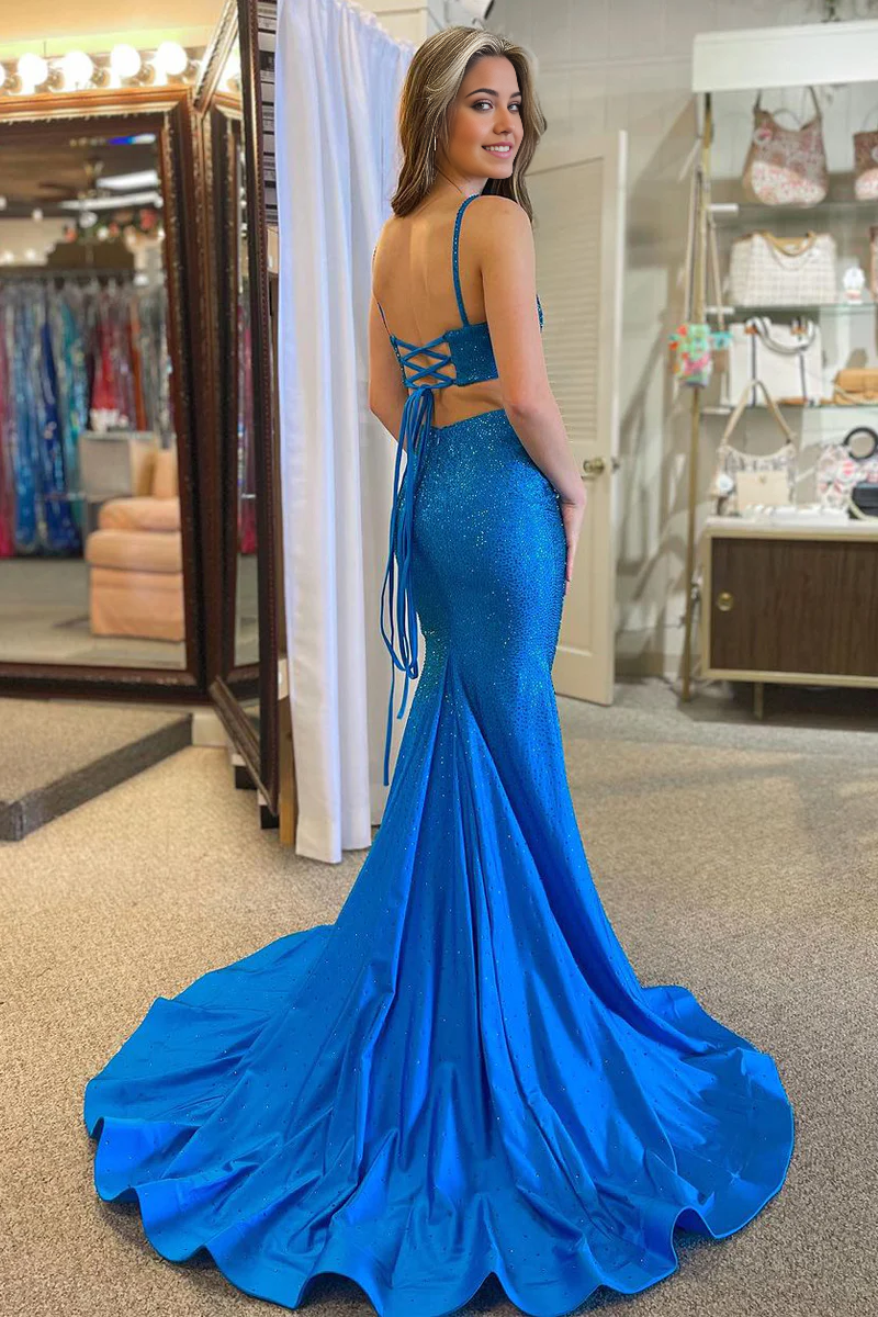 Back view of a royal blue satin mermaid prom dress.