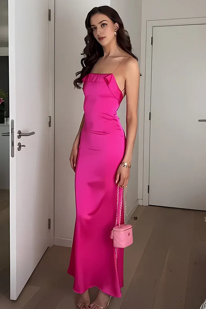Fuchsia mermaid satin prom dress with spaghetti straps.