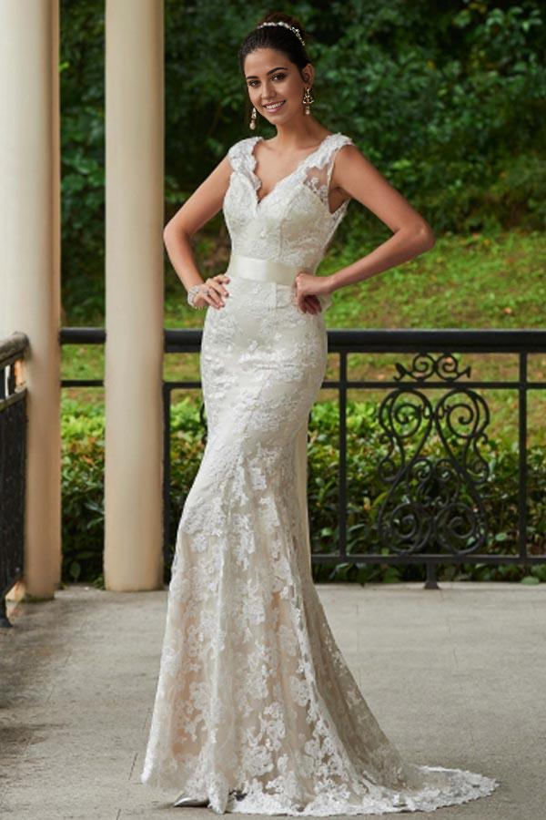 Elegant mermaid sheath V-neck lace wedding dress with a sweep train.