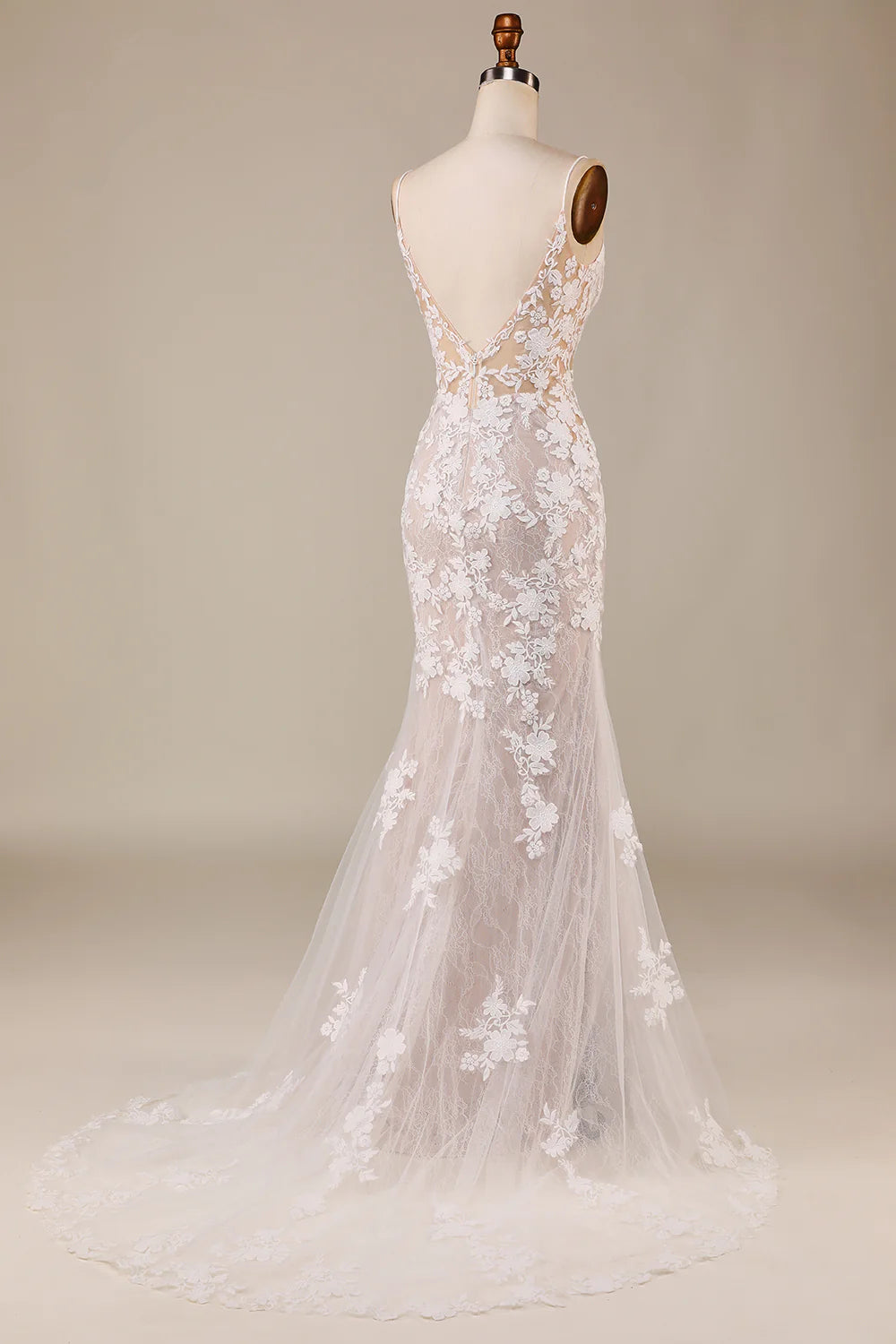 Back view of the mermaid wedding dress, showcasing delicate appliques and flowing train.
