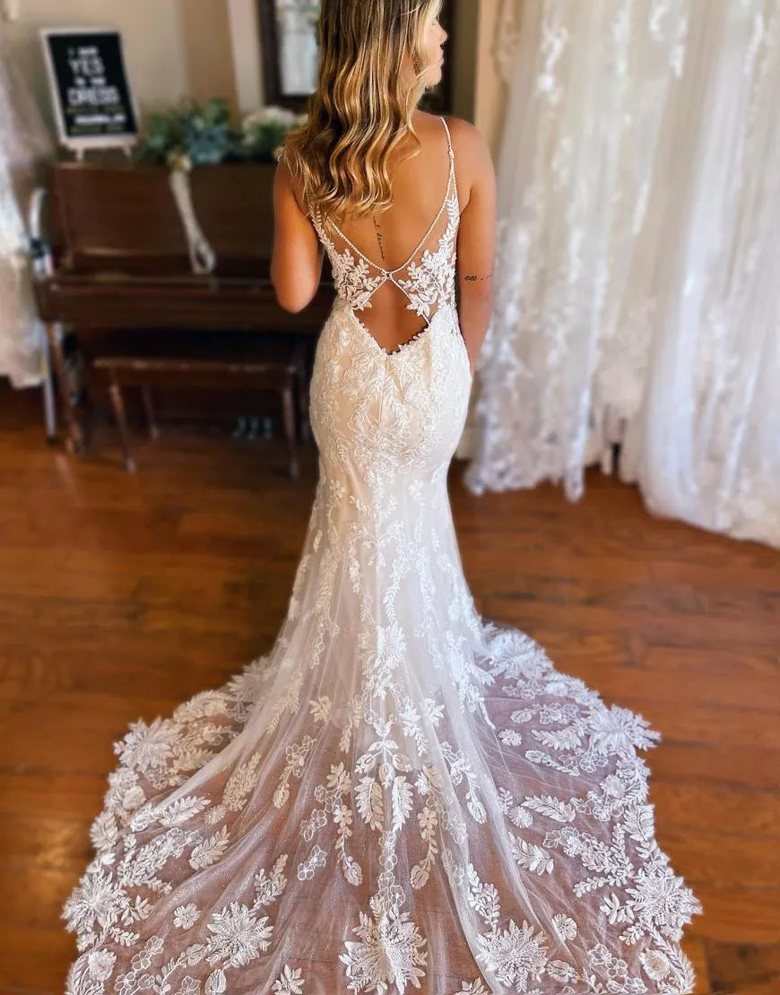 Front view of white mermaid wedding dress.