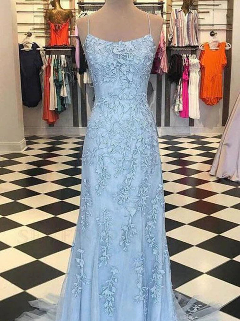 Elegant mermaid prom dress with lace appliques and spaghetti straps.