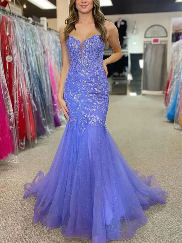 Elegant mermaid prom dress with spaghetti straps and lace details, front view.