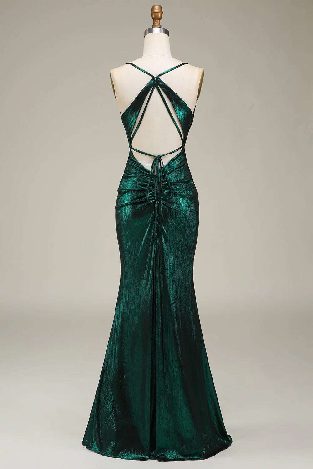 Back view of a dark green mermaid prom dress with an elegant open back.