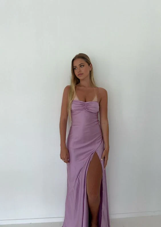 Elegant purple mermaid prom dress with spaghetti straps and a side split.