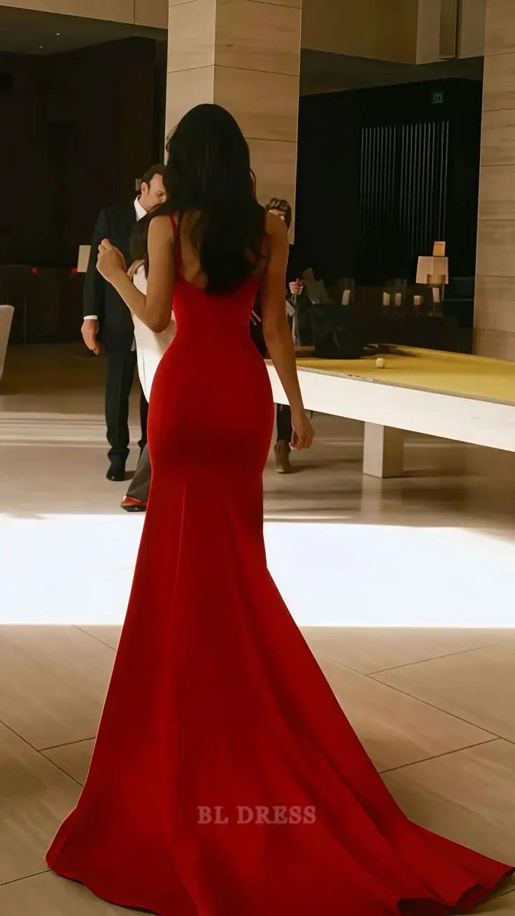 Side view of the red satin mermaid formal dress with delicate spaghetti straps.