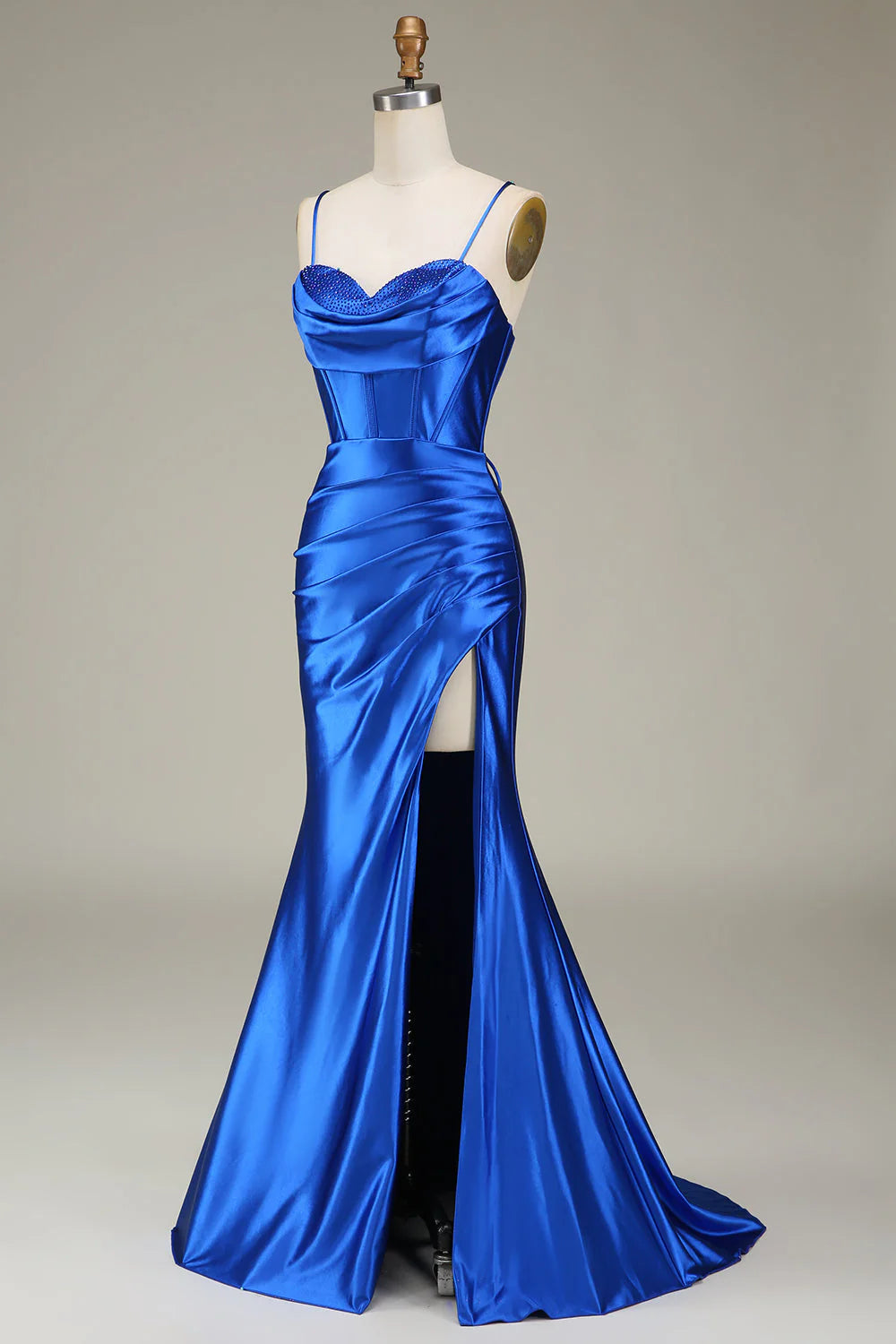 Side profile of the royal blue spaghetti strap dress.