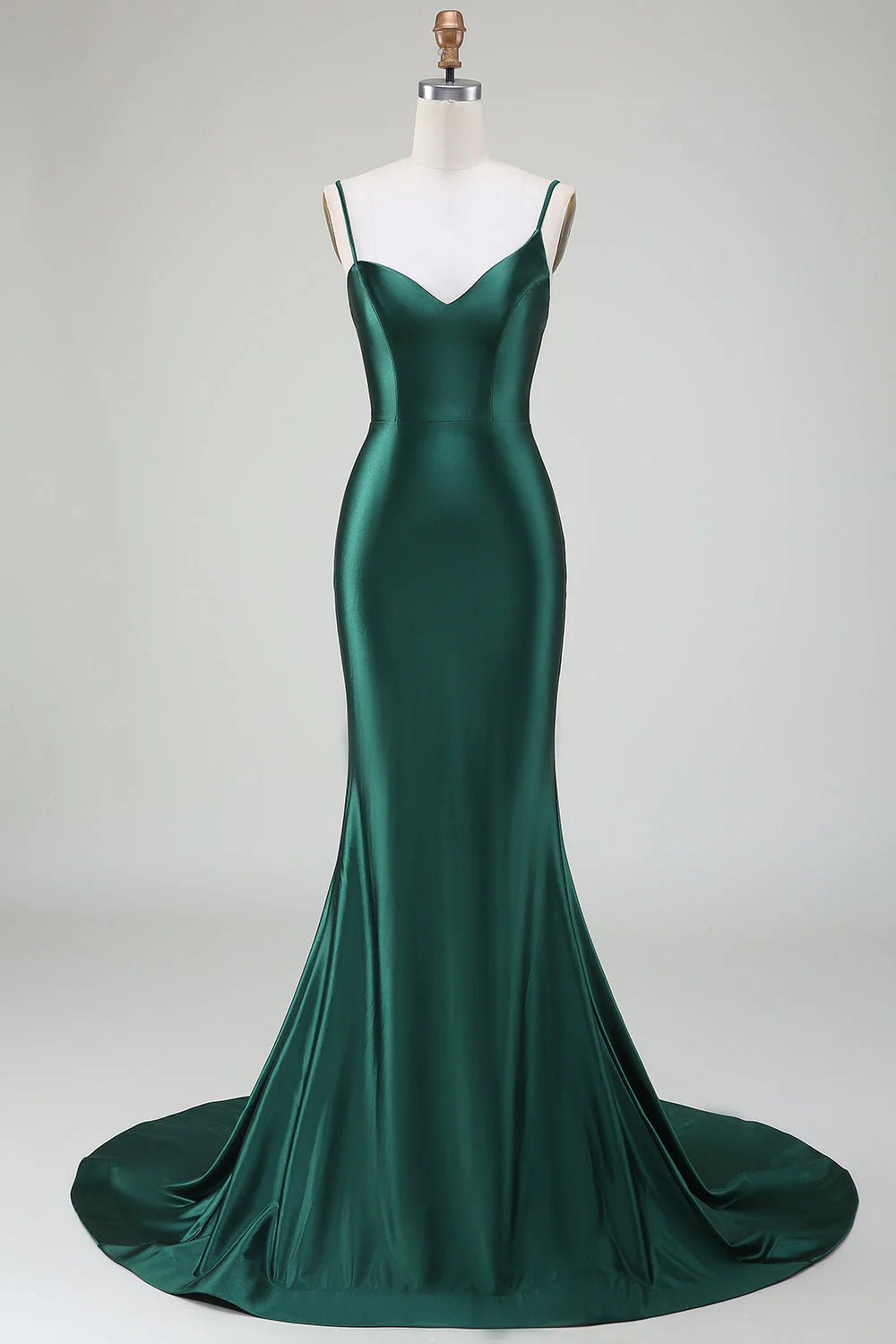 Dark green mermaid prom dress with spaghetti straps and sweep train.