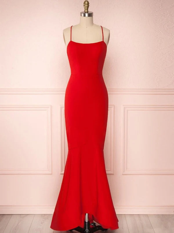 Elegant mermaid prom dress with spaghetti straps and backless design.