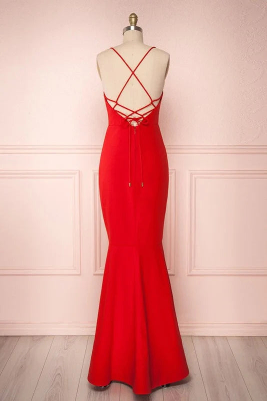 Back view of the mermaid prom dress showing spaghetti straps and open back.