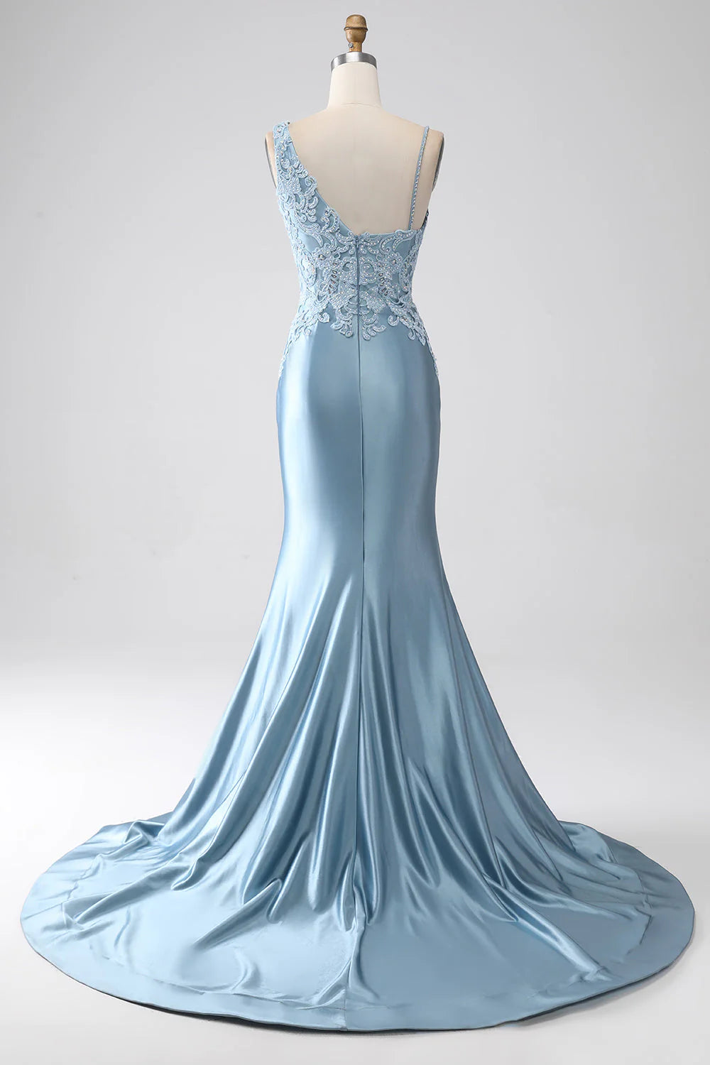 Side view of the grey-blue mermaid prom dress, highlighting the fitted silhouette and embellishments.