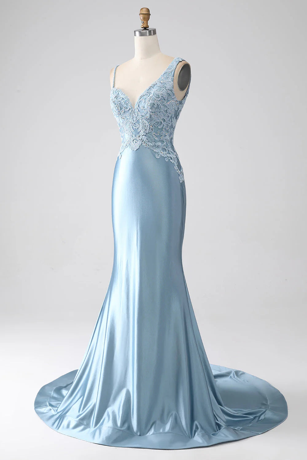 Back view of the grey-blue mermaid prom dress, showcasing the flowing train and detailed appliques.