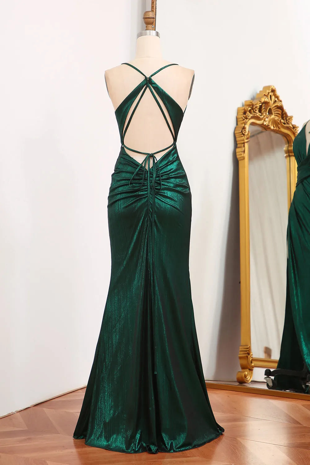 Side view of the dark green mermaid prom dress, highlighting the silhouette.