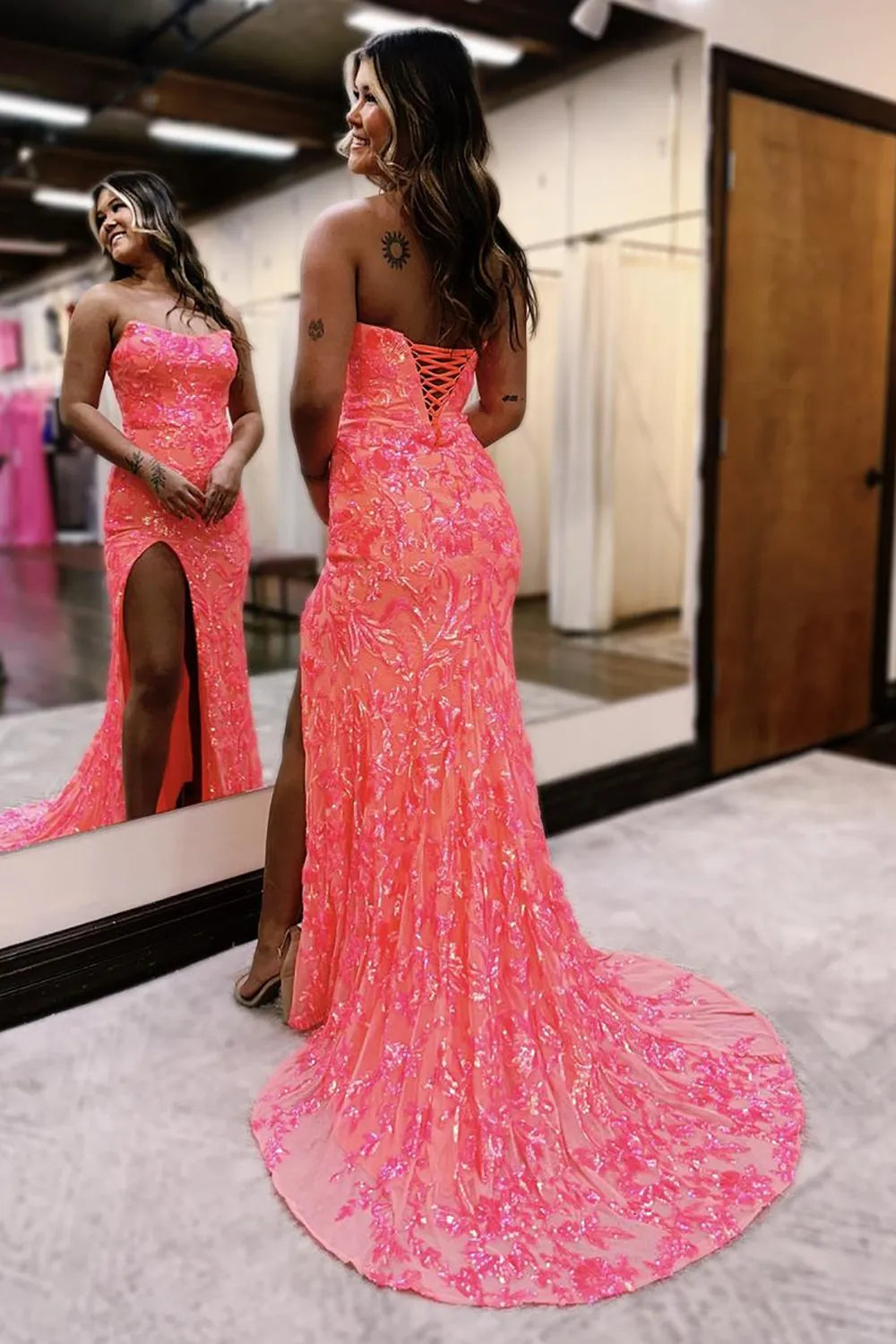 Back view of the mermaid lace-up prom dress.