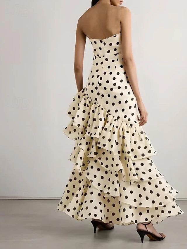 Mermaid formal dress with a strapless sweetheart neckline and ruffled skirt.