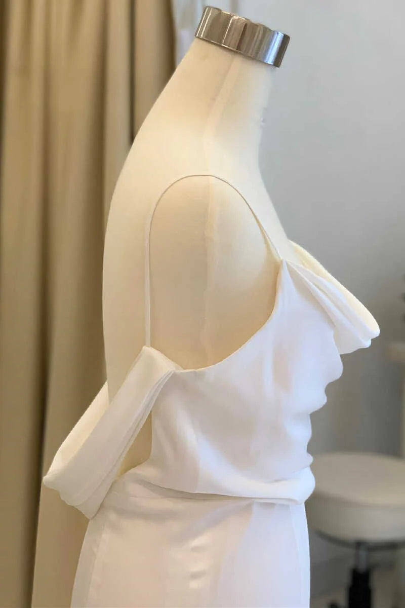 Side view of the mermaid wedding gown, highlighting the flowing skirt.