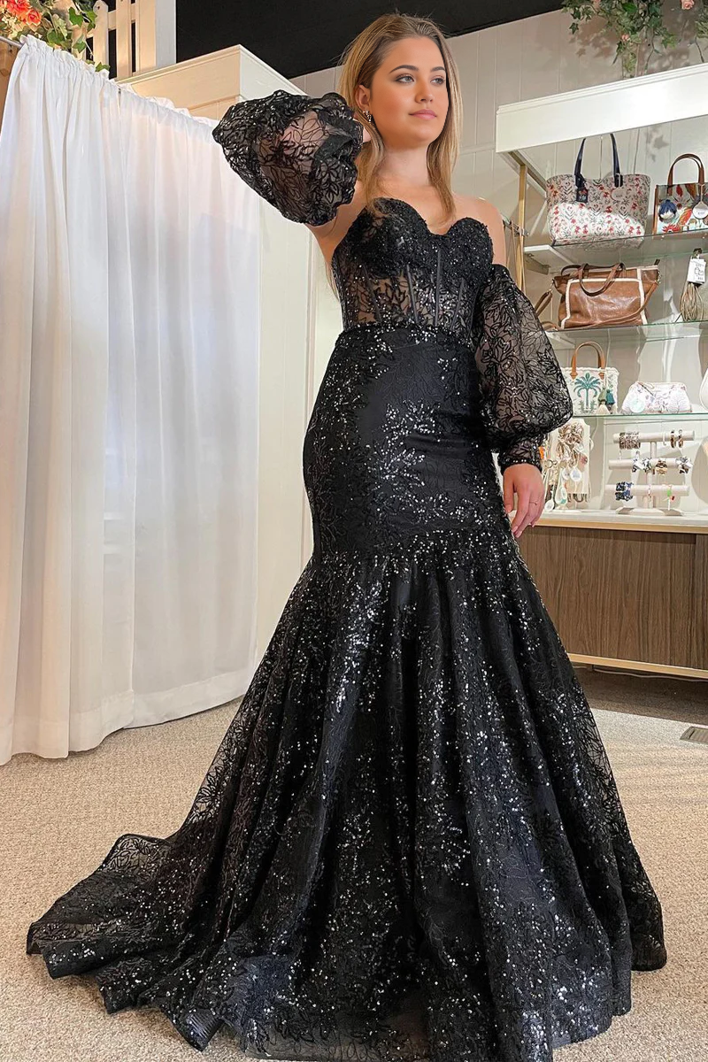 Elegant black mermaid prom dress with sweetheart neckline, long sleeves, and sequin lace details.