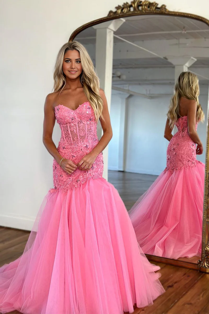 Hot pink mermaid prom dress with sweetheart neckline and lace details.