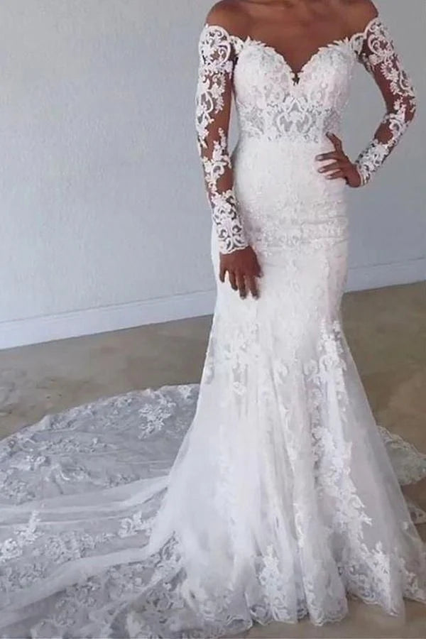 Elegant mermaid wedding dress with sweetheart neckline and long lace sleeves.