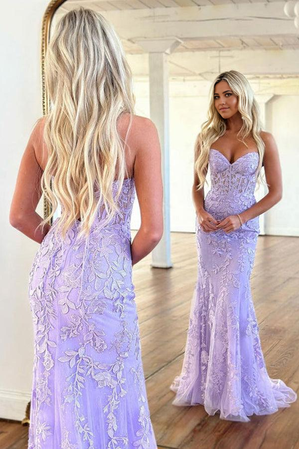 Back view of a long purple mermaid formal dress.