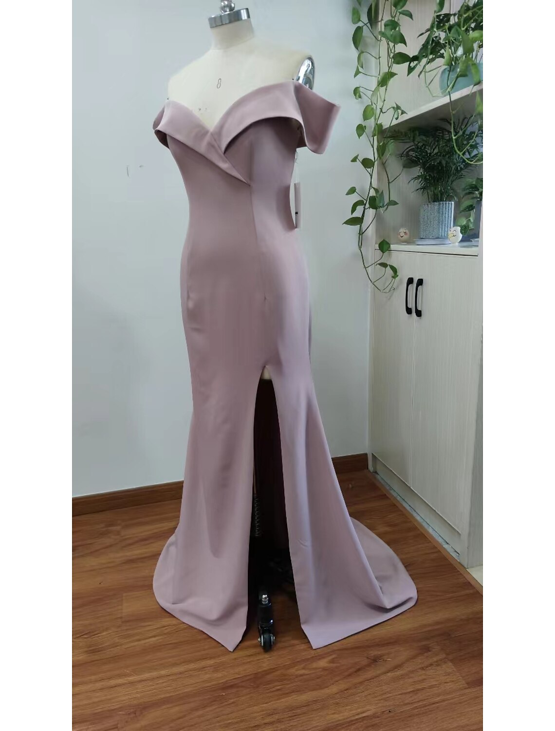 Back view of the elegant short sleeve sweetheart evening gown.