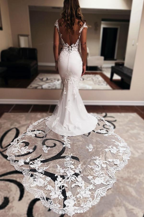 Back view of the backless mermaid wedding dress with chapel train.