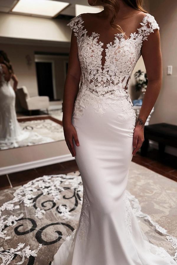 Close-up of the sweetheart neckline and bodice of the wedding gown.