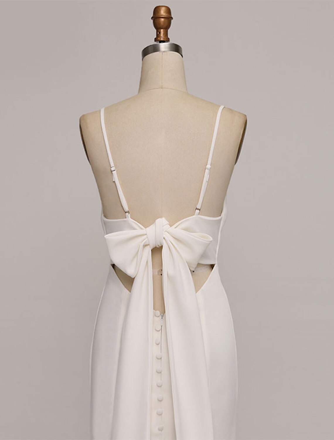 Back view of the sweetheart wedding dress, highlighting the graceful court train.