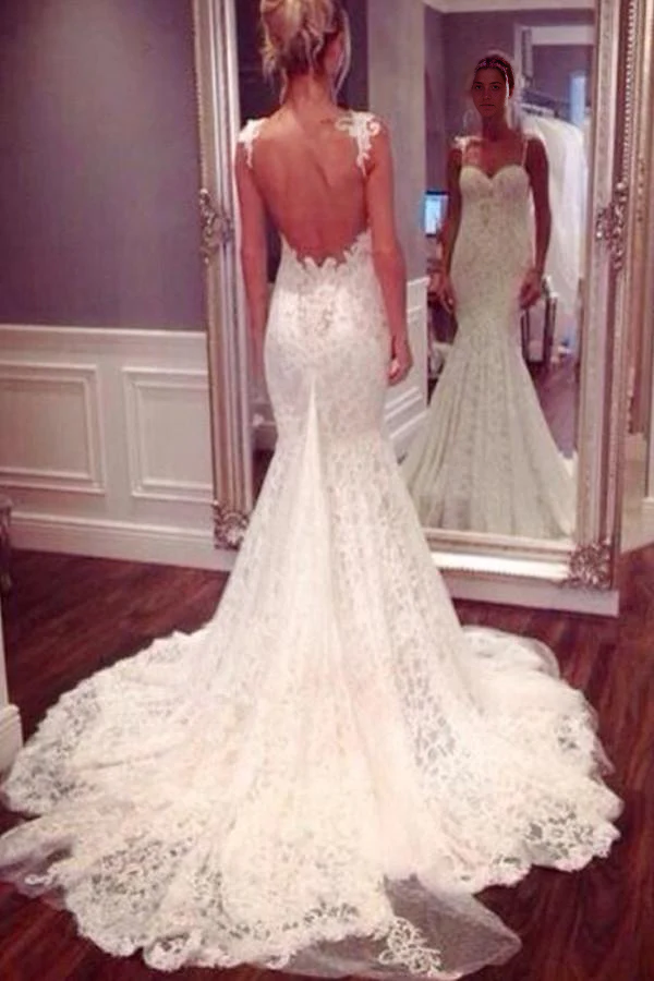 Back view of the lace mermaid wedding gown with delicate straps.