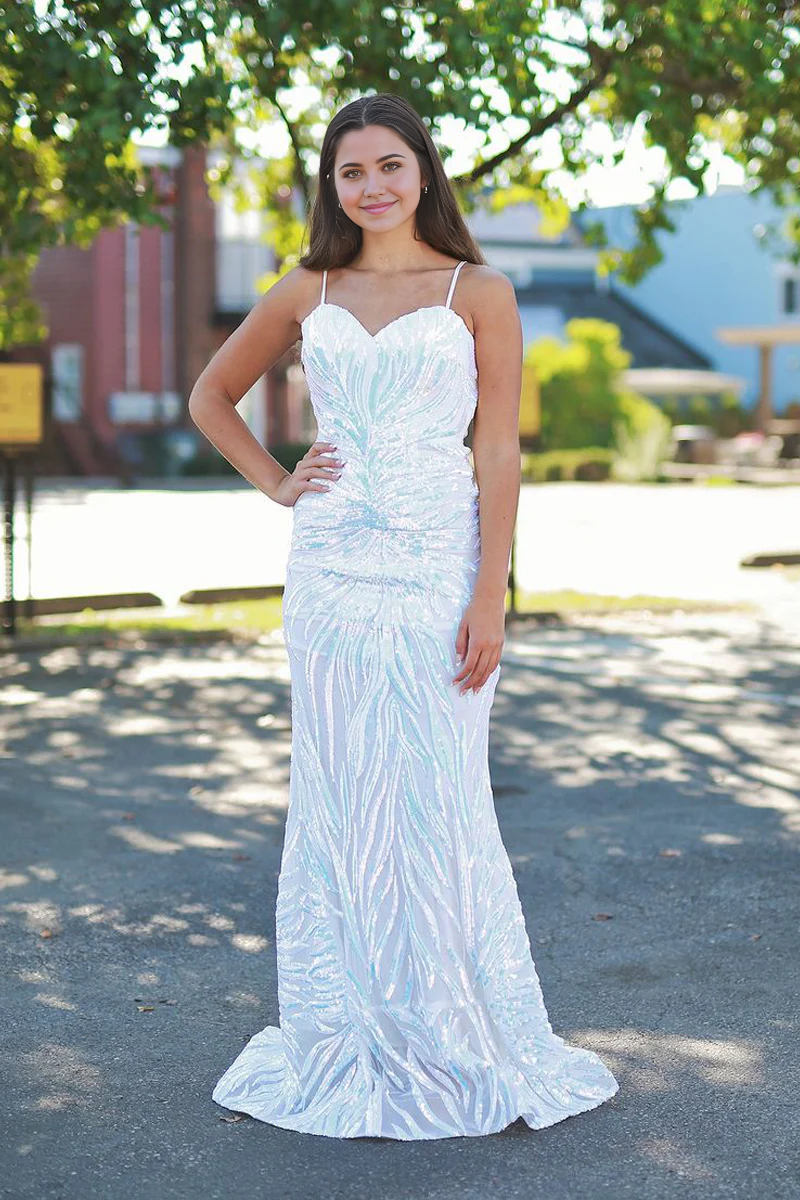 Elegant white sequin mermaid prom dress with sweetheart neckline.
