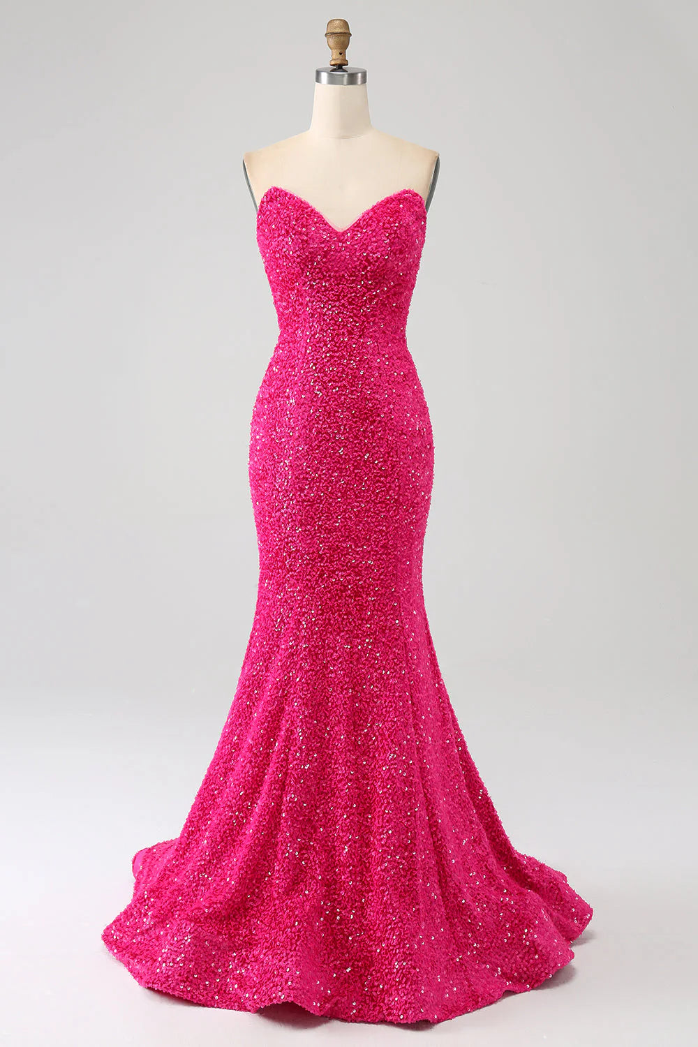 Vibrant Fuchsia mermaid prom dress with sweetheart neckline.