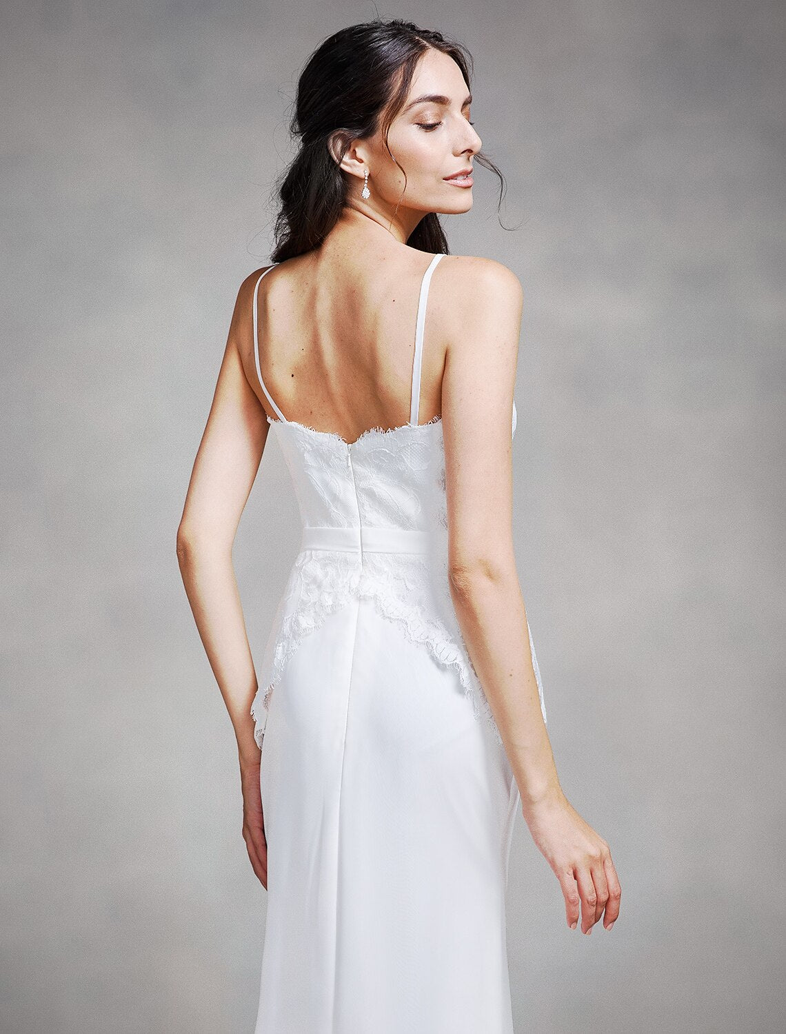 Mermaid trumpet bridesmaid dress with delicate lace details.