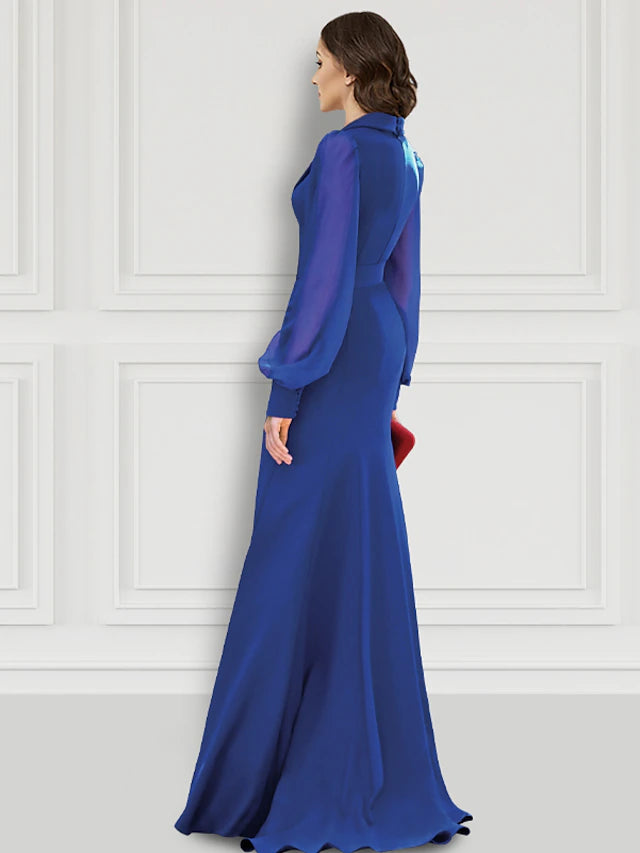 Back view of the elegant Mermaid Trumpet evening gown, showcasing the sweep train.
