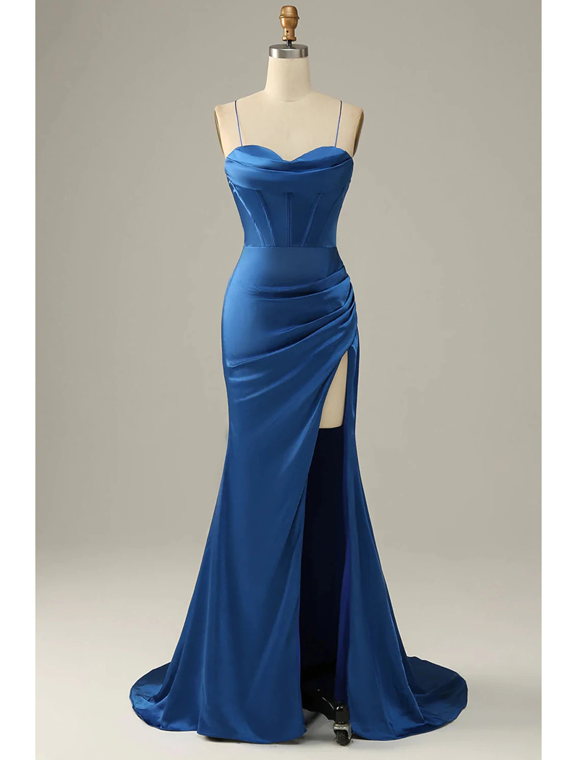 Full view of an elegant mermaid trumpet evening gown with a cowl neck and ruched satin fabric.