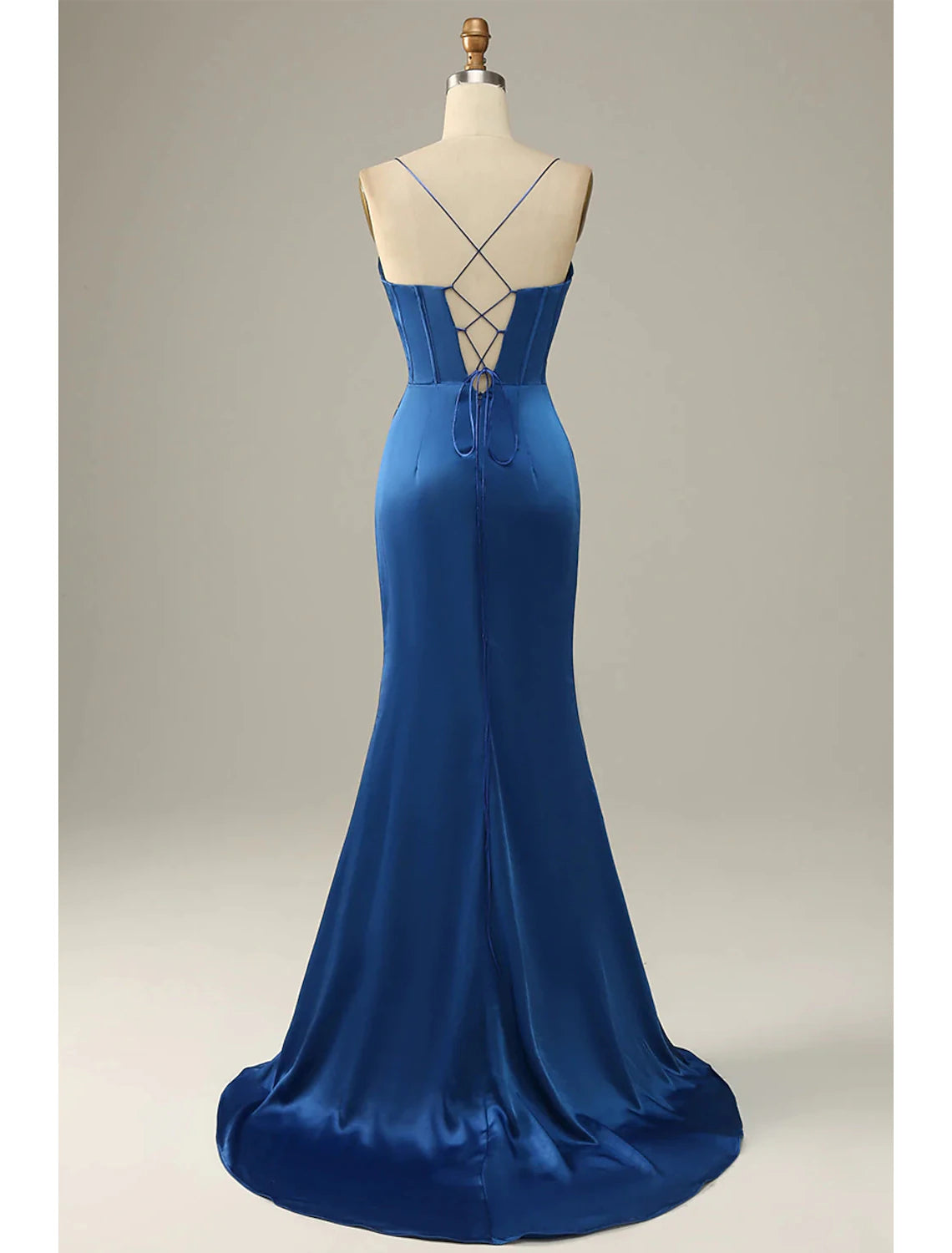 Side view of the mermaid trumpet evening gown, highlighting its floor-length silhouette.