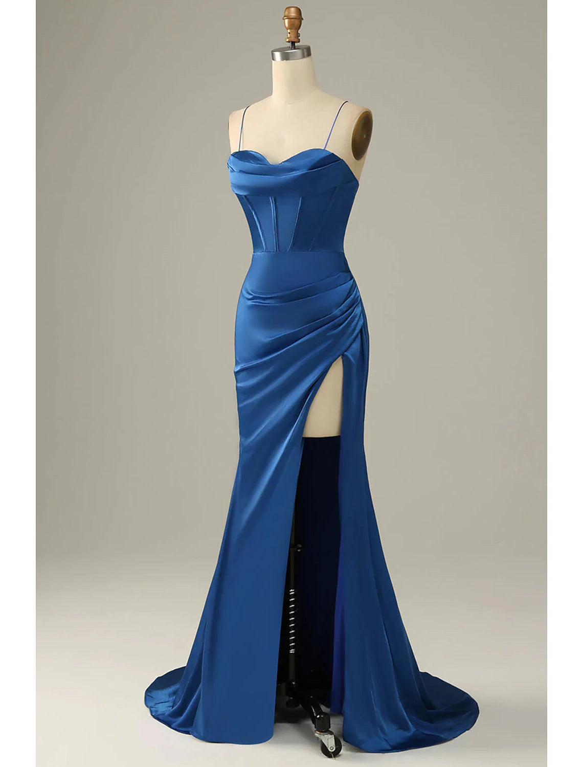 Close-up of the cowl neck and ruched detail on the satin evening gown.