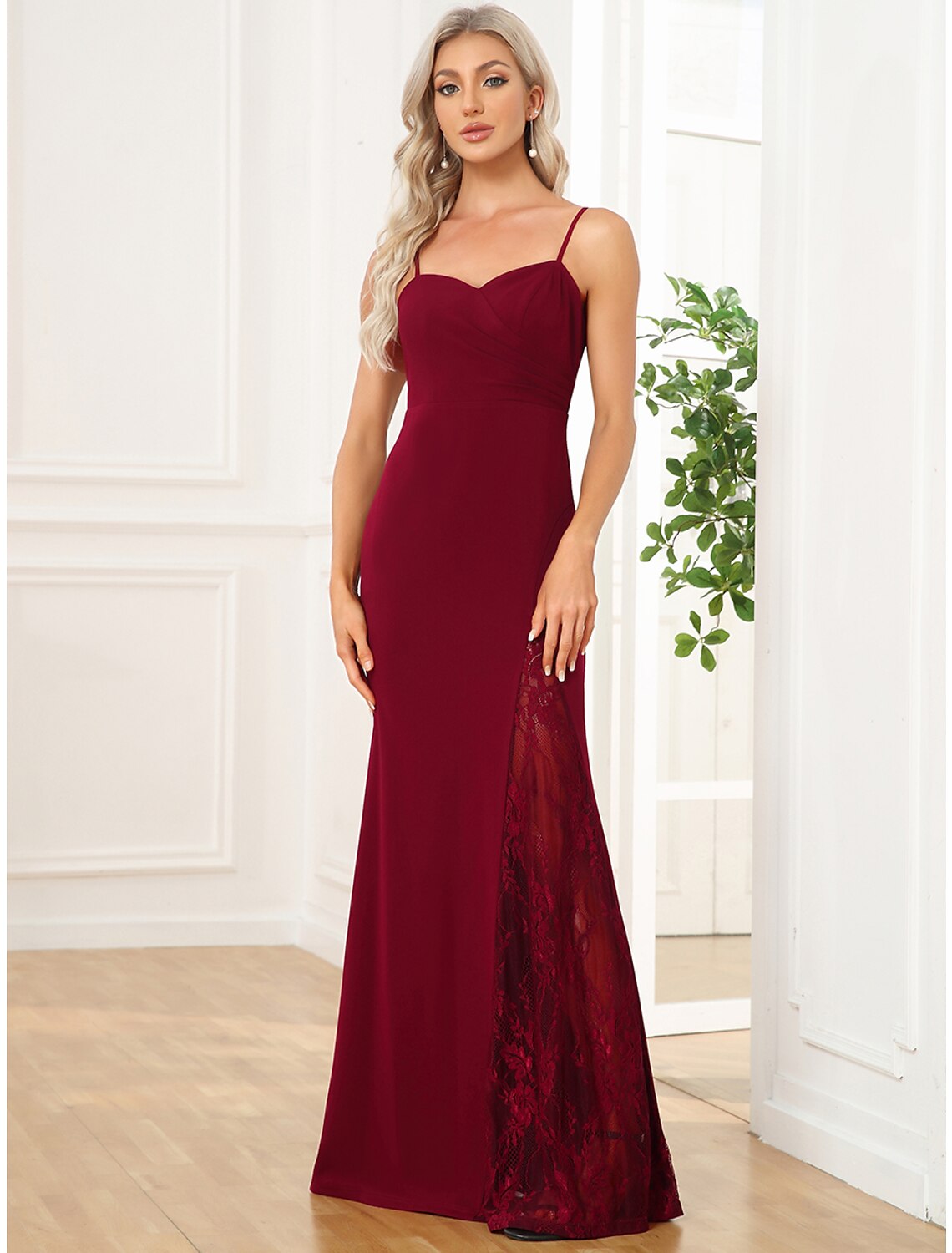 Close-up of the embroidered details on a V-neck formal dress.