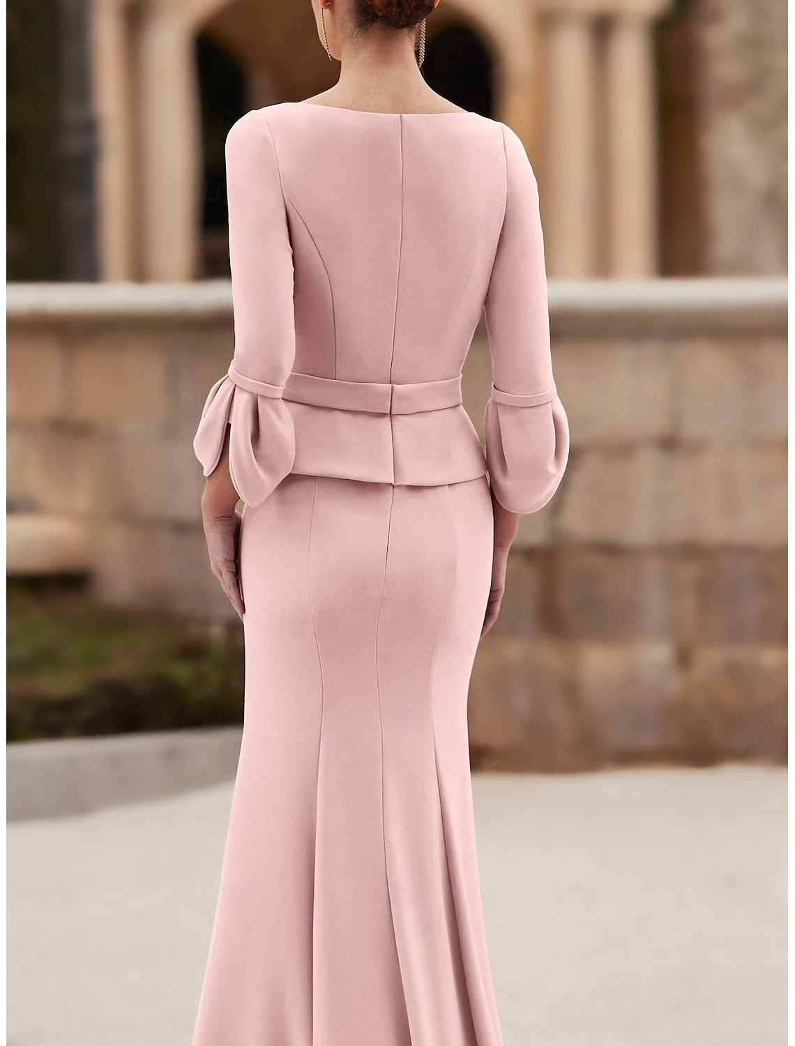 Back view of a floor-length Chiffon Crepe gown, suitable for wedding guests.