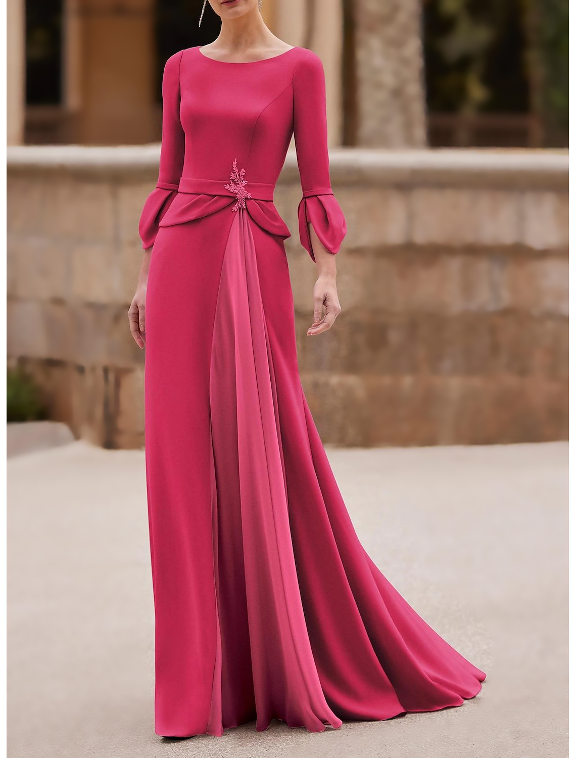 Side view of the formal dress, highlighting the crystal brooch detail.