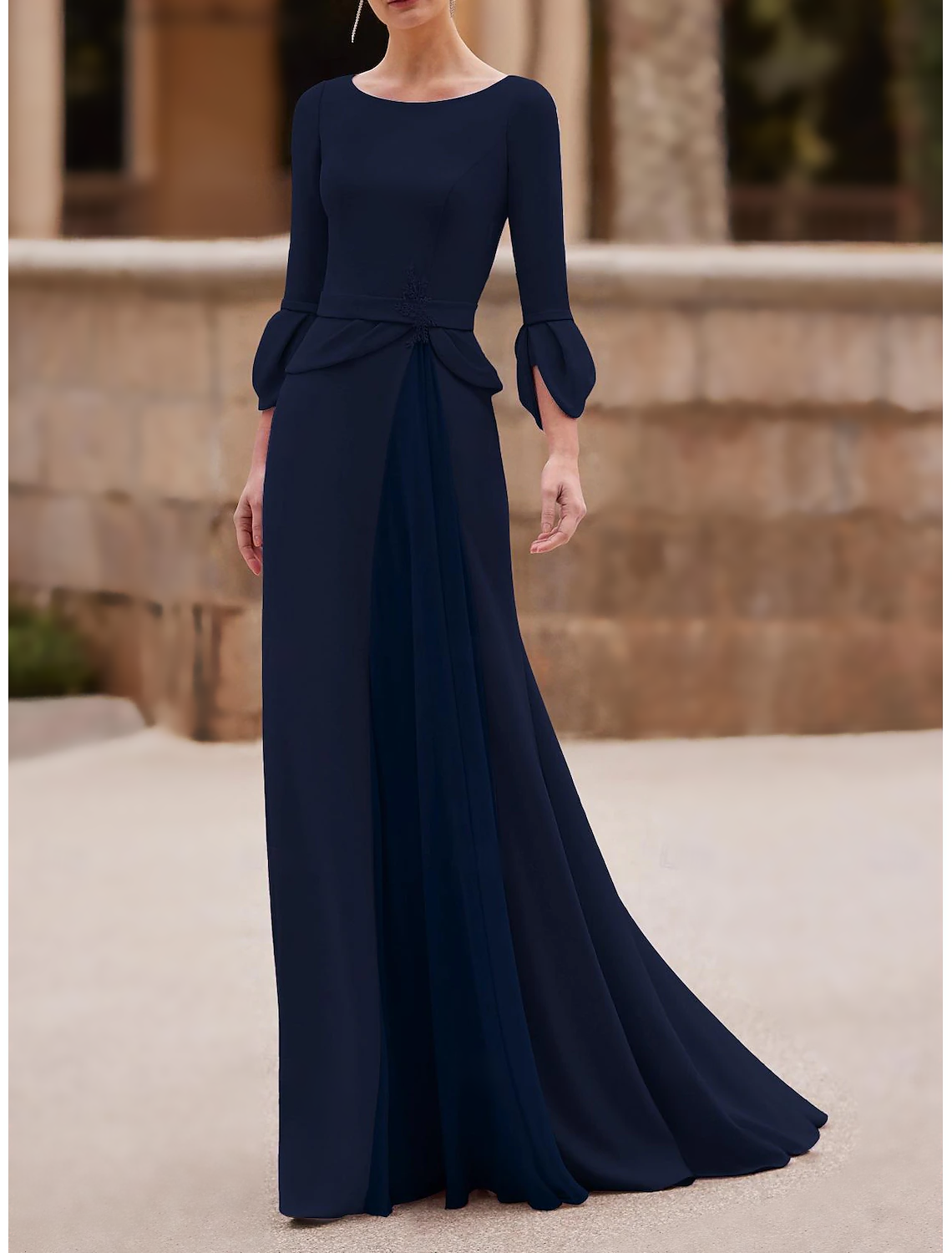 Close-up of the Jewel Neckline and 3/4 length sleeve on the elegant gown.