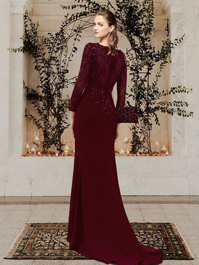 Back view of a Mermaid Trumpet Mother of the Bride dress showing sweep train and lace details.