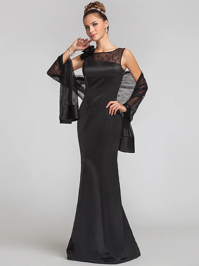Side view of sleeveless mermaid trumpet dress with matching wrap.
