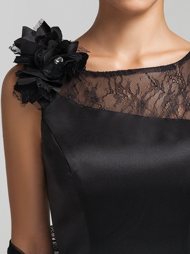 Model wearing a jewel neck floor length satin lace dress.