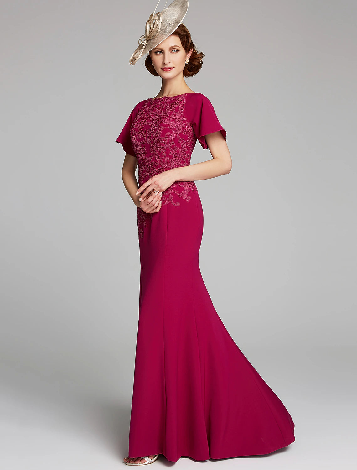 Full length view of the Mermaid Trumpet gown, showcasing its elegant silhouette.