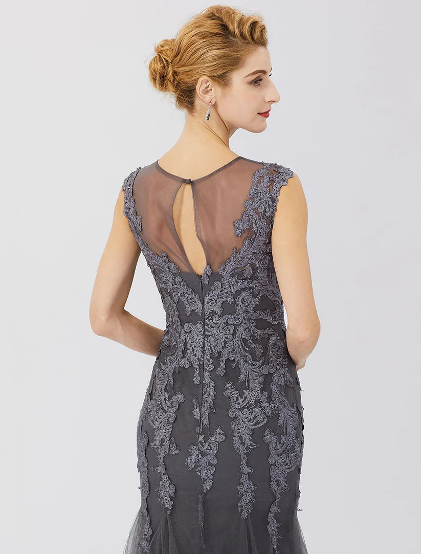 Close-up of the illusion neckline and intricate lace appliques on the Mother of the Bride dress.